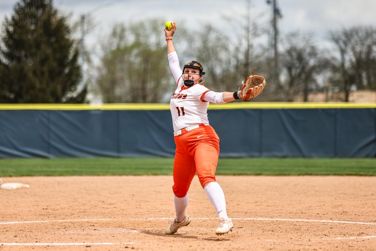 Toledo, OH - Falcons junior pitcher Mackenzie Krafcik (11) pitches the ball against the Rockets at the Scott Park Softball Complex in Toledo, Ohio.